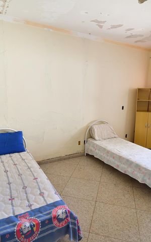 Casa à venda com 600m², 5 quartos e 4 vagasQuarto 4 - Suíte