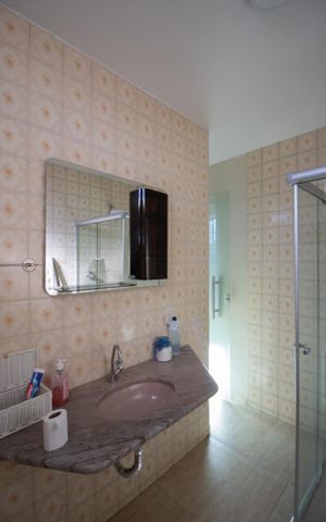 Casa à venda com 300m², 3 quartos e 4 vagas Casa à venda com 300m², 3 quartos e 4 vagasBanheiro da Suíte