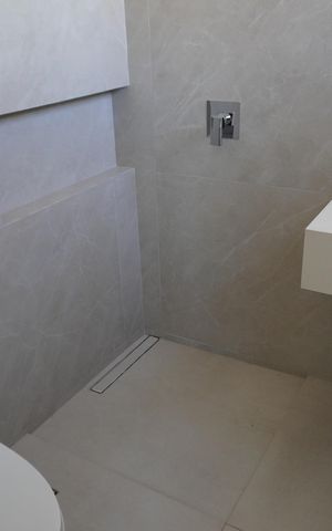 Casa de condomínio para alugar com 300m², 4 quartos e 4 vagasBanheiro da Suíte 2