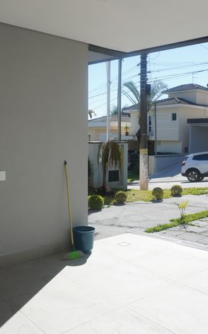 Casa de condomínio para alugar com 300m², 4 quartos e 4 vagasGaragem