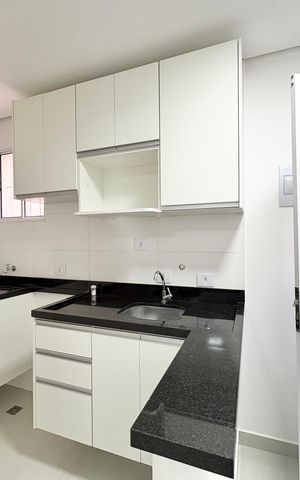 Casa de condomínio para alugar com 80m², 2 quartos e 1 vaga Casa de condomínio para alugar com 80m², 2 quartos e 1 vagaCozinha e Área de Serviço