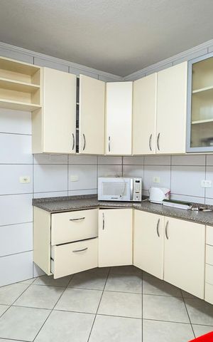 Casa para alugar com 150m², 2 quartos e 2 vagasCozinha