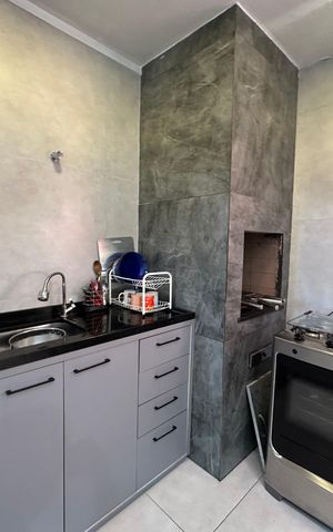 Casa à venda com 230m², 4 quartos e 2 vagas Casa à venda com 230m², 4 quartos e 2 vagasChurrasqueira