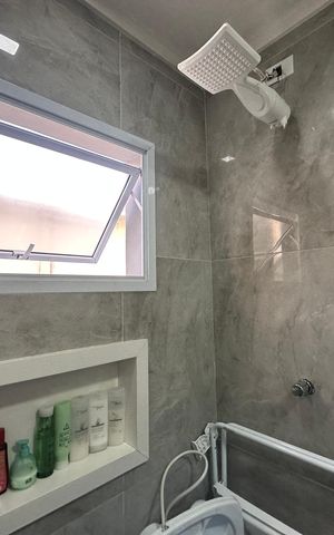 Casa à venda com 230m², 4 quartos e 2 vagas Casa à venda com 230m², 4 quartos e 2 vagasBanheiro da Suíte 1