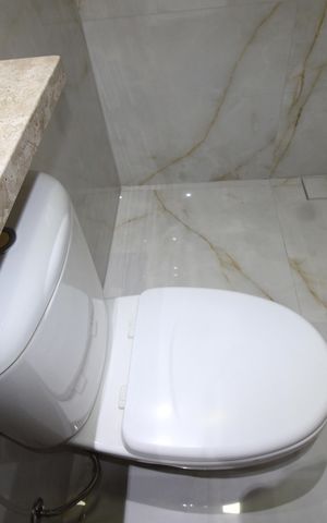 Casa à venda com 210m², 3 quartos e 4 vagasBanheiro da Suíte 2