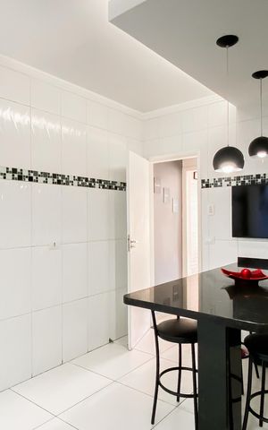Casa à venda com 125m², 2 quartos e 3 vagas Casa à venda com 125m², 2 quartos e 3 vagasCozinha