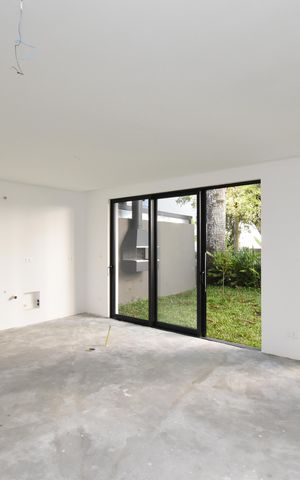 Casa de condomínio à venda com 126m², 2 quartos e 2 vagasSala e Cozinha