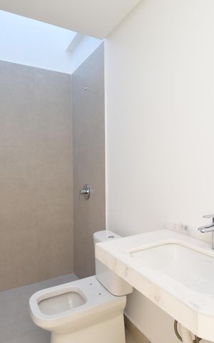 Casa de condomínio à venda com 126m², 2 quartos e 2 vagasBanheiro social