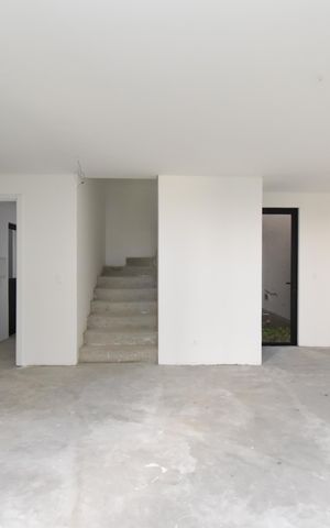 Casa de condomínio à venda com 136m², 3 quartos e 2 vagasSala e Cozinha