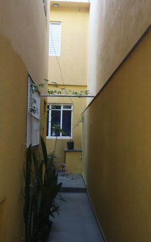 Casa à venda com 125m², 3 quartos e 2 vagasCorredor externo