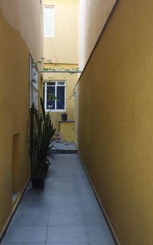 Casa à venda com 125m², 3 quartos e 2 vagasCorredor externo