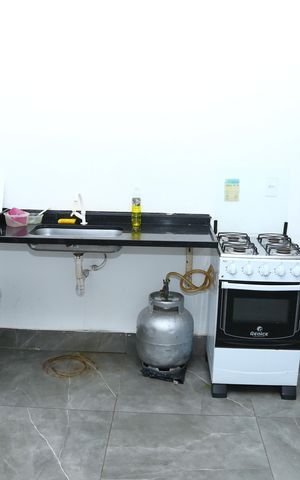 Casa à venda com 210m², 5 quartos e 4 vagasSala/Cozinha 