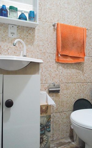 Casa à venda com 120m², 3 quartos e 2 vagasBanheiro da Suíte 1