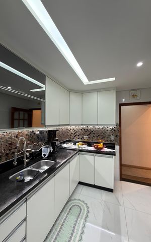 Apartamento à venda com 106m², 3 quartos e 2 vagas Apartamento à venda com 106m², 3 quartos e 2 vagasCozinha e Área de Serviço