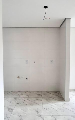 Apartamento à venda com 55m², 2 quartos e 1 vaga Apartamento à venda com 55m², 2 quartos e 1 vagaCozinha