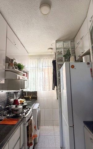 Apartamento à venda com 48m², 2 quartos e 1 vaga Apartamento à venda com 48m², 2 quartos e 1 vagaCozinha