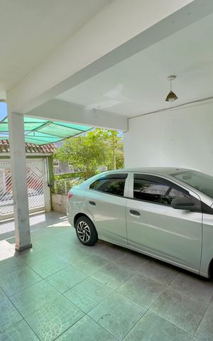 Casa à venda com 100m², 5 quartos e 2 vagas Casa à venda com 100m², 5 quartos e 2 vagasGaragem