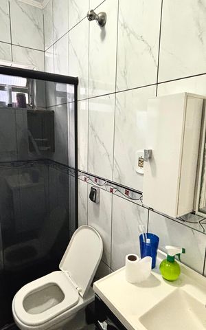 Casa à venda com 347m², 3 quartos e 3 vagas Casa à venda com 347m², 3 quartos e 3 vagasBanheiro social