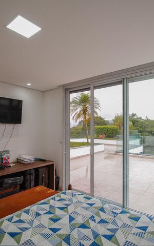 Casa de condomínio à venda com 616m², 5 quartos e 4 vagas