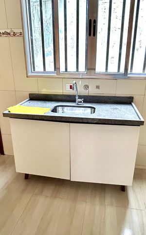 Casa à venda com 125m², 2 quartos e 2 vagas Casa à venda com 125m², 2 quartos e 2 vagasCozinha