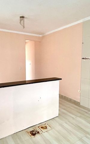 Casa à venda com 125m², 2 quartos e 2 vagas Casa à venda com 125m², 2 quartos e 2 vagasCozinha