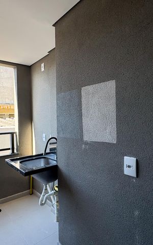 Apartamento à venda com 46m², 2 quartos e 1 vaga Apartamento à venda com 46m², 2 quartos e 1 vagaSacada e área de serviço