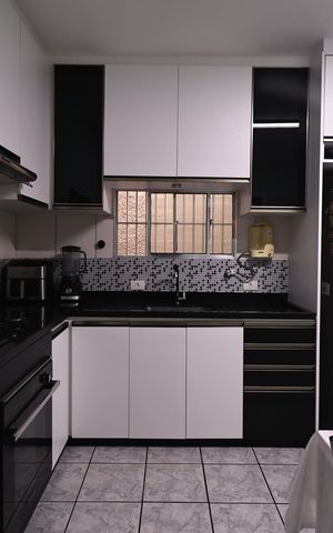 Casa à venda com 150m², 2 quartos e 2 vagas Casa à venda com 150m², 2 quartos e 2 vagasCozinha