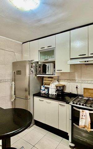 Casa à venda com 100m², 2 quartos e 2 vagas Casa à venda com 100m², 2 quartos e 2 vagasCozinha