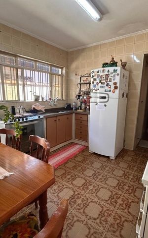 Casa à venda com 138m², 3 quartos e 2 vagas Casa à venda com 138m², 3 quartos e 2 vagasCozinha