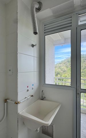Apartamento à venda com 60m², 3 quartos e 1 vaga Apartamento à venda com 60m², 3 quartos e 1 vagaCozinha e Área de Serviço