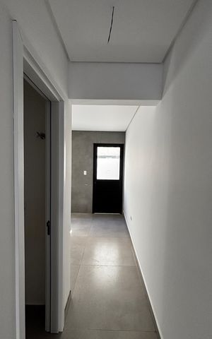 Casa à venda com 126m², 3 quartos e 2 vagas Casa à venda com 126m², 3 quartos e 2 vagasCorredor