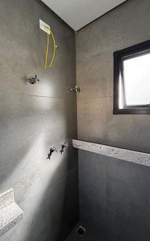 Casa à venda com 126m², 3 quartos e 2 vagas Casa à venda com 126m², 3 quartos e 2 vagasBanheiro da Suíte 1