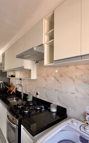 Apartamento à venda com 45m², 2 quartos e 1 vaga Apartamento à venda com 45m², 2 quartos e 1 vagaCozinha e Área de Serviço