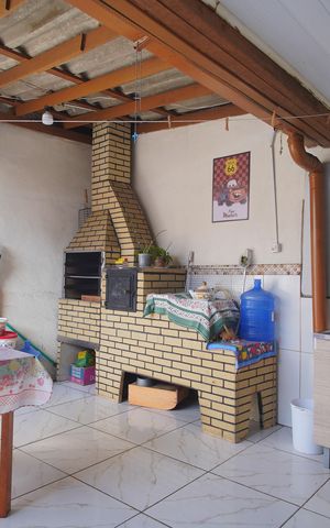 Casa à venda com 180m², 3 quartos e 6 vagasChurrasqueira 1