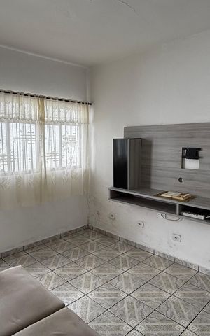 Casa à venda com 156m², 2 quartos e 2 vagas Casa à venda com 156m², 2 quartos e 2 vagasSala
