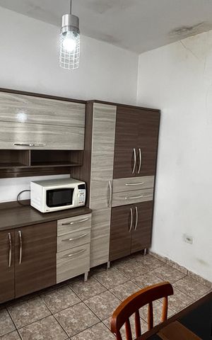 Casa à venda com 156m², 2 quartos e 2 vagas Casa à venda com 156m², 2 quartos e 2 vagasCozinha