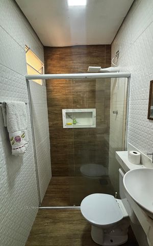 Casa à venda com 240m², 3 quartos e 2 vagas Casa à venda com 240m², 3 quartos e 2 vagasCasa 1 - Suite Banheiro