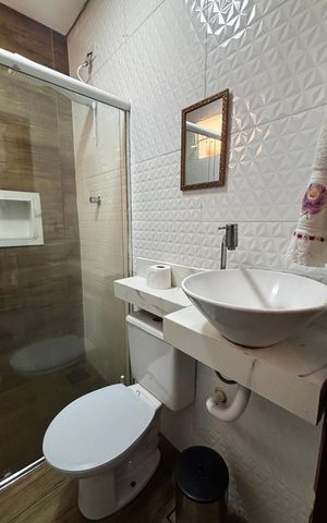 Casa à venda com 240m², 3 quartos e 2 vagas Casa à venda com 240m², 3 quartos e 2 vagasCasa 1 - Suite Banheiro