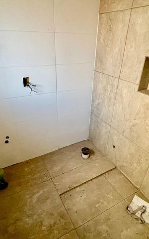 Casa à venda com 350m², 4 quartos e 4 vagas Casa à venda com 350m², 4 quartos e 4 vagasBanheiro da Suíte 1