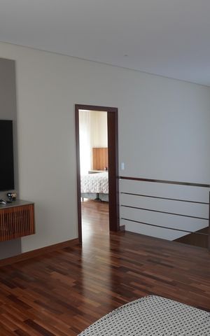 Casa de condomínio para alugar com 345m², 2 quartos e 4 vagasSala de TV
