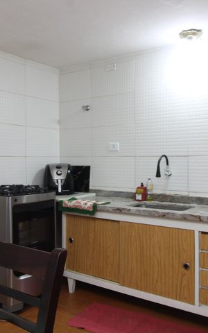 Casa à venda com 125m², 3 quartos e 1 vagacozinha casa 2
