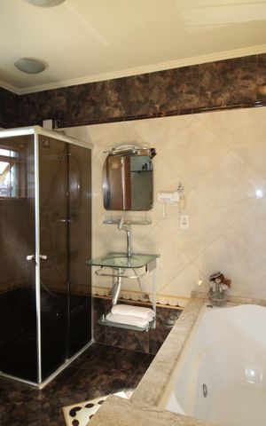 Casa para alugar com 100m², 4 quartos e 2 vagasBanheiro da Suíte 1