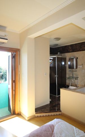 Casa para alugar com 100m², 4 quartos e 2 vagasSuíte 1