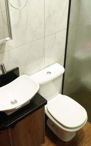 Casa à venda com 210m², 2 quartos e 2 vagasBanheiro da Suíte