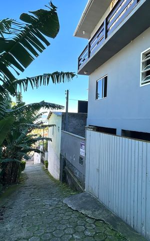 Casa para alugar com 84m², 3 quartos e 1 vaga Casa para alugar com 84m², 3 quartos e 1 vagaFachada