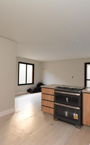 Casa de condomínio para alugar com 180m², 3 quartos e 2 vagasSala e cozinha