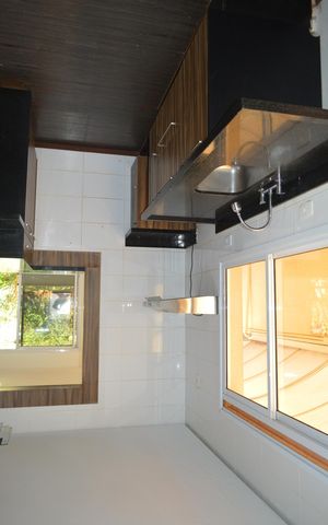 Casa de condomínio para alugar com 222m², 3 quartos e 4 vagasCozinha