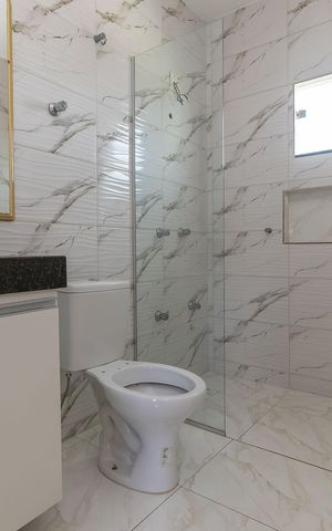 Casa à venda com 200m², 3 quartos e 3 vagasBanheiro Social Casa 1