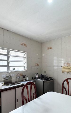 Casa à venda com 112m², 2 quartos e 2 vagas Casa à venda com 112m², 2 quartos e 2 vagasCozinha