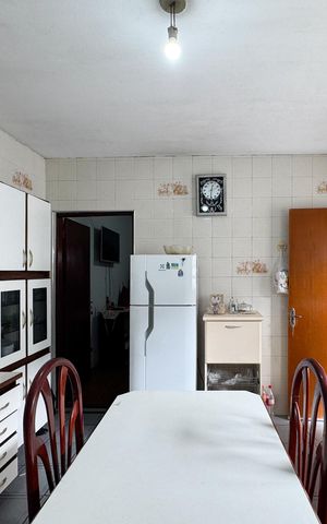 Casa à venda com 112m², 2 quartos e 2 vagas Casa à venda com 112m², 2 quartos e 2 vagasCozinha